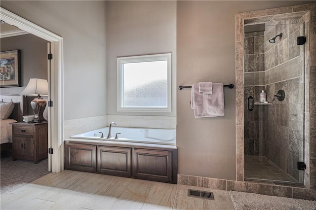 1217 Kingsland Cir, Raymore, MO 64083 - bathroom featuring a garden tub and a stall shower