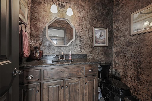 1217 Kingsland Cir, Raymore, MO 64083 - half bathroom with vanity and toilet
