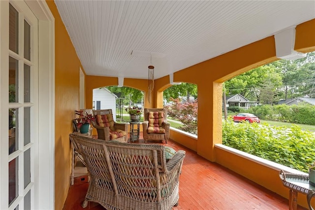 533 S Water St, Olathe, KS 66061 - sunroom featuring wood finished floors