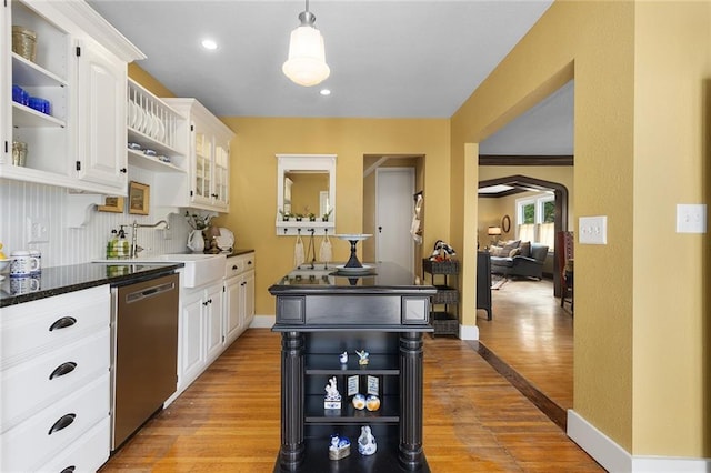 533 S Water St, Olathe, KS 66061 - kitchen with stainless steel dishwasher, open shelves, white cabinetry, and light wood-style floors