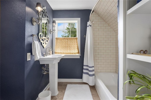 533 S Water St, Olathe, KS 66061 - full bath with shower / tub combo with curtain and tile patterned floors