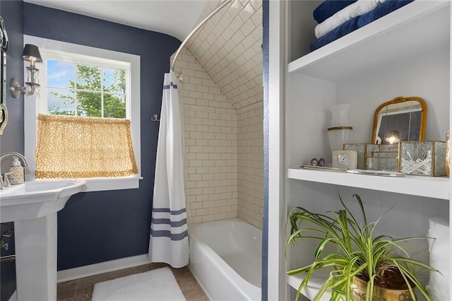 533 S Water St, Olathe, KS 66061 - full bathroom featuring shower / bath combo and tile patterned flooring