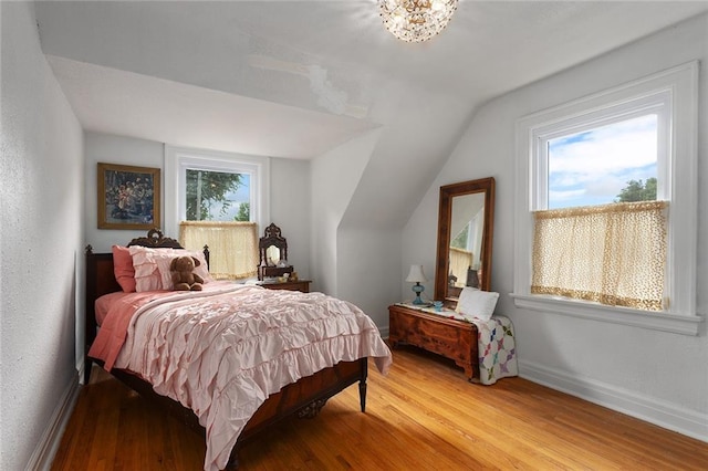 533 S Water St, Olathe, KS 66061 - bedroom with wood finished floors and vaulted ceiling
