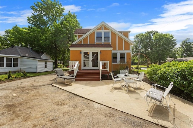 533 S Water St, Olathe, KS 66061 - rear view of house featuring french doors and a patio area
