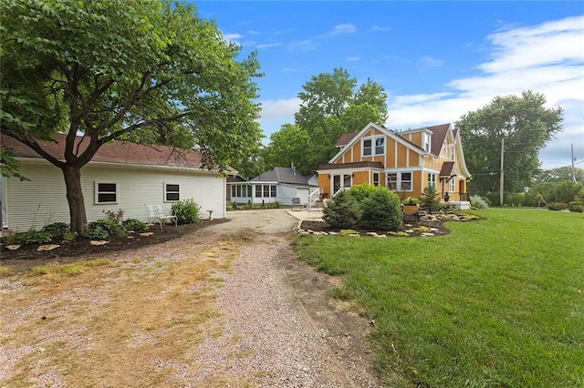533 S Water St, Olathe, KS 66061 - english style home featuring driveway and a front lawn