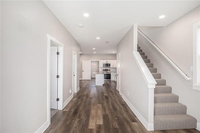1116 Splitlog Ave, Kansas City, KS 66102 - hall featuring dark wood-style flooring, stairway, and recessed lighting