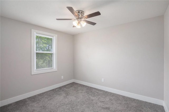 1116 Splitlog Ave, Kansas City, KS 66102 - spare room featuring carpet and ceiling fan