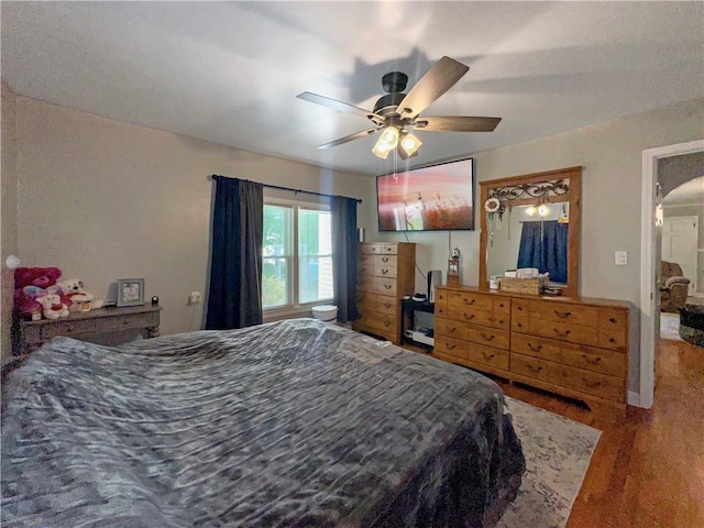 1607 S St, Lexington, MO 64067 - bedroom with wood finished floors and ceiling fan