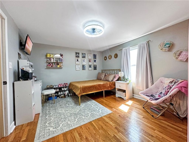 1607 S St, Lexington, MO 64067 - bedroom featuring wood finished floors