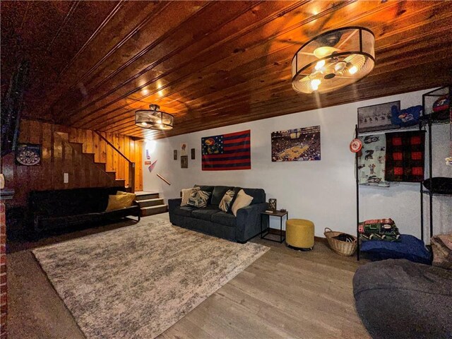 1607 S St, Lexington, MO 64067 - living area with stairs, wood ceiling, and wood finished floors