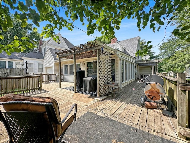 1607 S St, Lexington, MO 64067 - wooden deck with a fire pit and a pergola