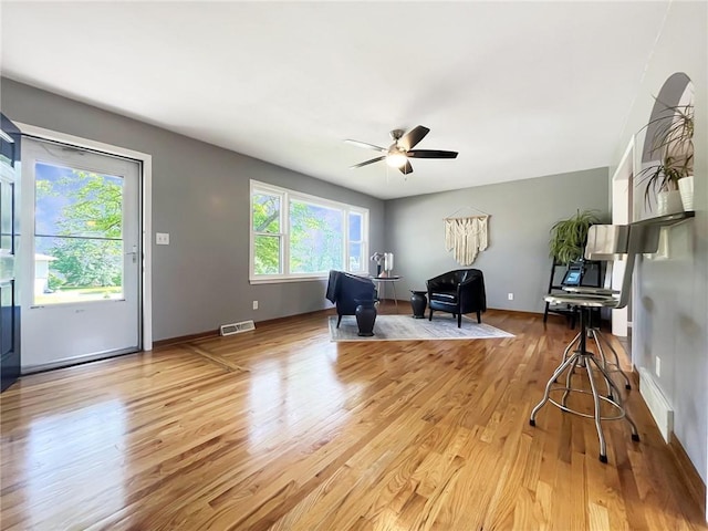 118 Fern St, Lansing, KS 66043 - living area featuring light wood finished floors and a ceiling fan