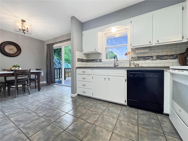 118 Fern St, Lansing, KS 66043 - kitchen featuring dishwasher, electric stove, backsplash, light tile patterned floors, and dark countertops