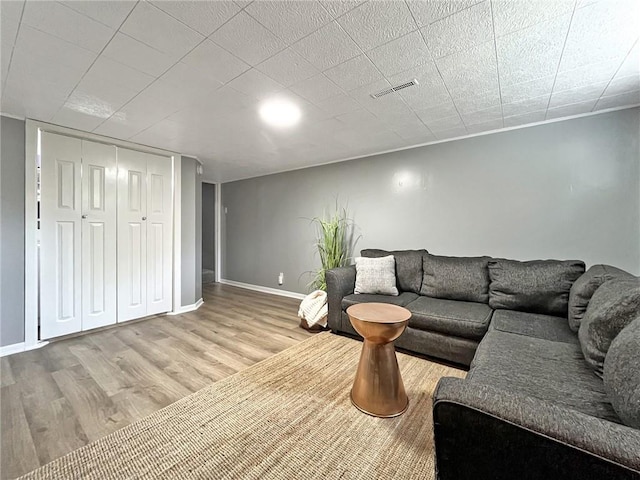 118 Fern St, Lansing, KS 66043 - living area with wood finished floors and baseboards