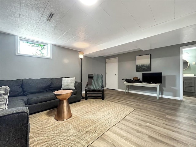 118 Fern St, Lansing, KS 66043 - living room featuring wood finished floors and baseboards