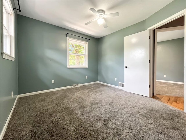 118 Fern St, Lansing, KS 66043 - spare room featuring carpet floors and ceiling fan