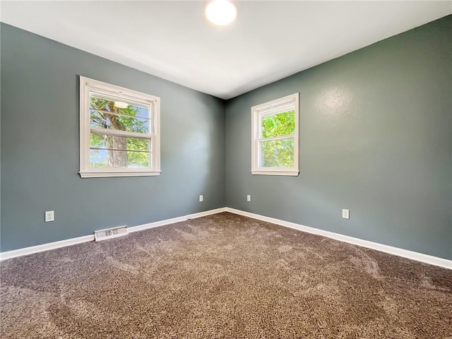 118 Fern St, Lansing, KS 66043 - unfurnished room with carpet floors and baseboards