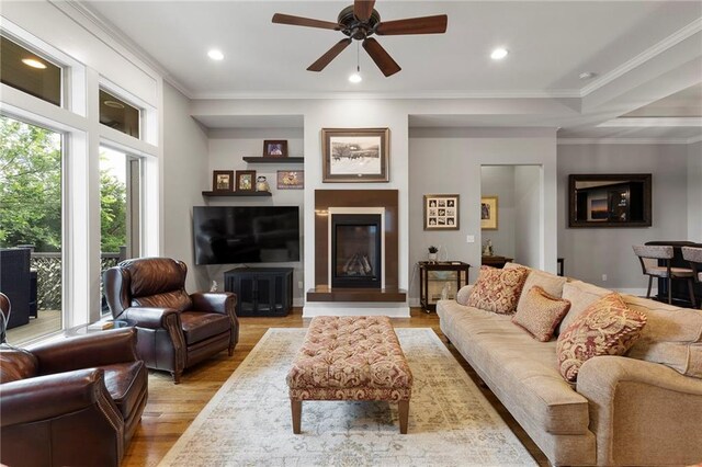 11717 S Barth Rd, Olathe, KS 66061 - living room with ceiling fan, light wood-style flooring, recessed lighting, and ornamental molding