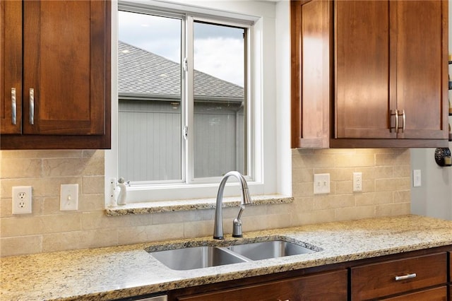 11717 S Barth Rd, Olathe, KS 66061 - kitchen featuring decorative backsplash and light stone counters