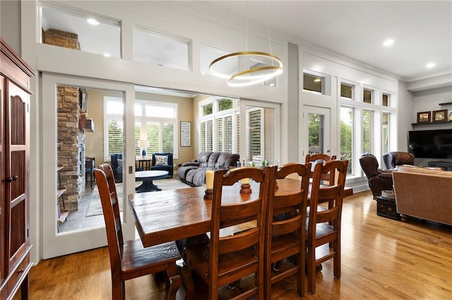 11717 S Barth Rd, Olathe, KS 66061 - dining space featuring ornamental molding, light wood finished floors, and recessed lighting