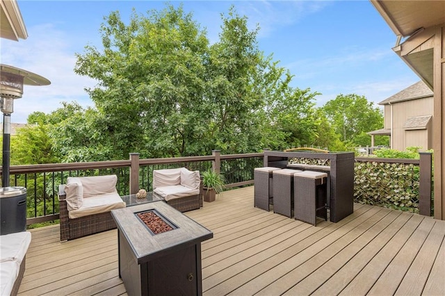 11717 S Barth Rd, Olathe, KS 66061 - wooden terrace with an outdoor fire pit