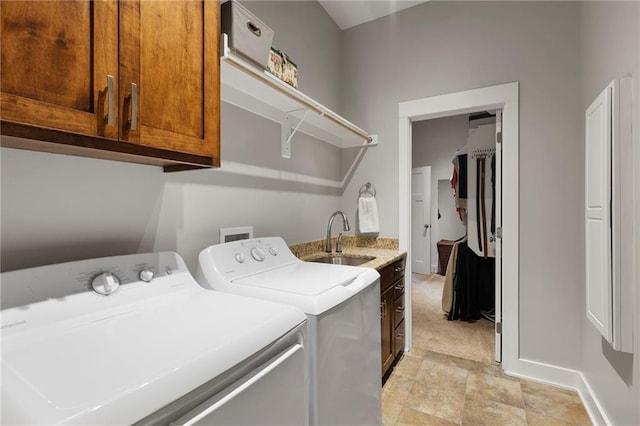 11717 S Barth Rd, Olathe, KS 66061 - washroom with cabinet space, washer and dryer, and stone finish floors