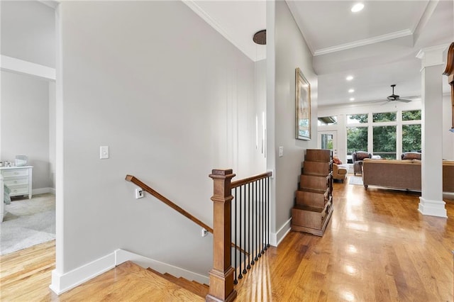11717 S Barth Rd, Olathe, KS 66061 - hallway featuring an upstairs landing, crown molding, wood finished floors, and recessed lighting