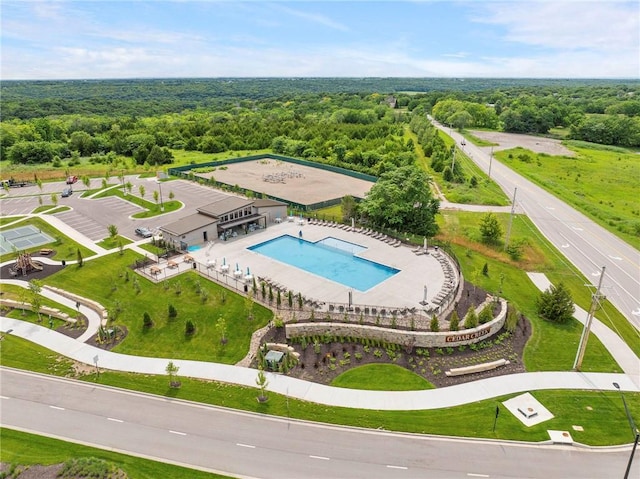 11717 S Barth Rd, Olathe, KS 66061 - bird's eye view of a pool and a heavily wooded area
