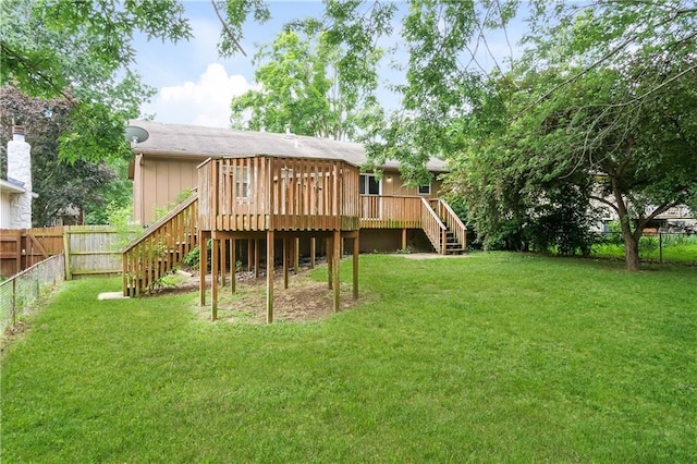 20408 E 15th Ter, Independence, MO 64056 - rear view of house with stairway, a fenced backyard, and a deck
