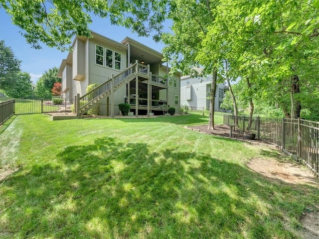 11599 S Carbondale St, Olathe, KS 66061 - back of house with stairway and a fenced backyard