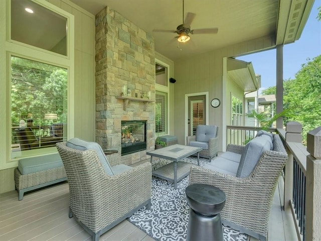 11599 S Carbondale St, Olathe, KS 66061 - sunroom with ceiling fan and an outdoor living space with a fireplace