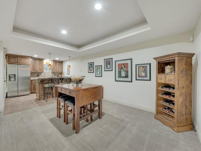 11599 S Carbondale St, Olathe, KS 66061 - dining room with a raised ceiling, recessed lighting, light carpet, and crown molding