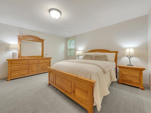 11599 S Carbondale St, Olathe, KS 66061 - bedroom with light carpet and a textured ceiling