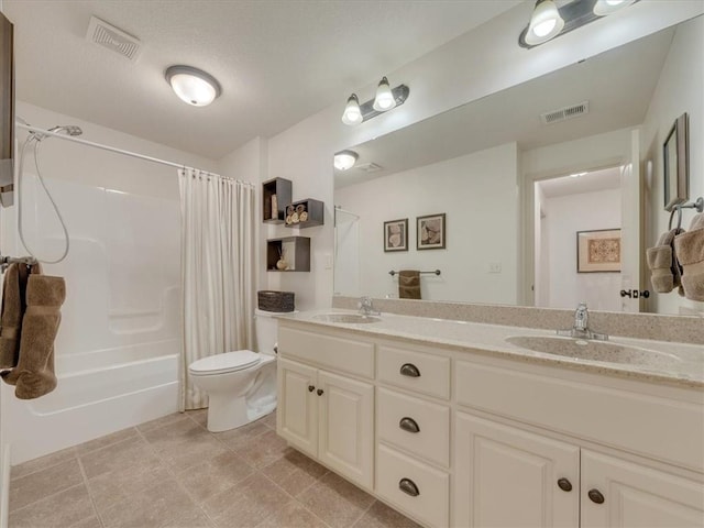 11599 S Carbondale St, Olathe, KS 66061 - bathroom featuring double vanity, shower / tub combo with curtain, and tile patterned flooring