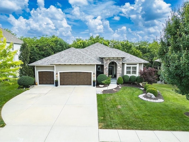 11599 S Carbondale St, Olathe, KS 66061 - view of front of home with a garage, a front yard, driveway, and a shingled roof