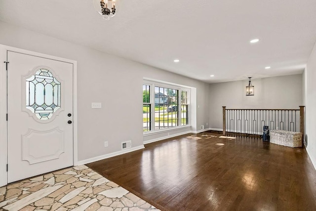 4309 S Huntington Way, Independence, MO 64055 - entryway with wood finished floors, recessed lighting, and a chandelier