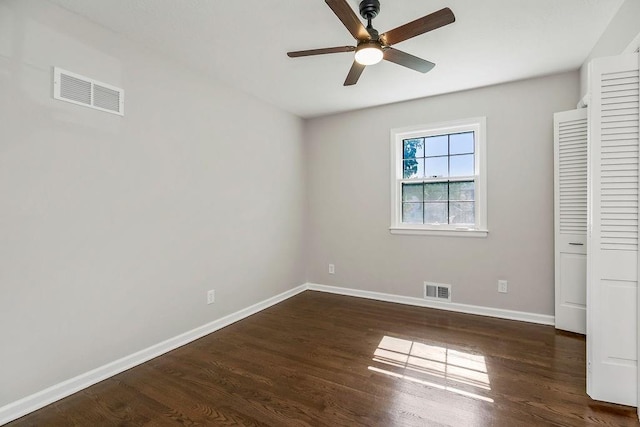 4309 S Huntington Way, Independence, MO 64055 - unfurnished bedroom featuring wood finished floors and a ceiling fan