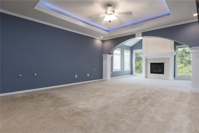 8620 N Eastern Ave, Kansas City, MO 64157 - unfurnished living room with a raised ceiling, carpet floors, ceiling fan, healthy amount of natural light, and crown molding