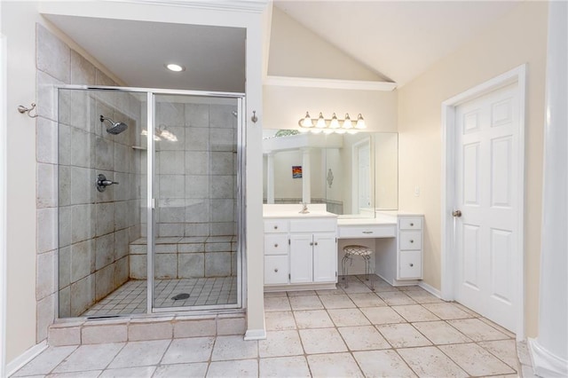 8620 N Eastern Ave, Kansas City, MO 64157 - bathroom featuring vanity, a stall shower, vaulted ceiling, tile patterned floors, and recessed lighting
