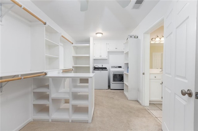 8620 N Eastern Ave, Kansas City, MO 64157 - spacious closet featuring separate washer and dryer and light colored carpet
