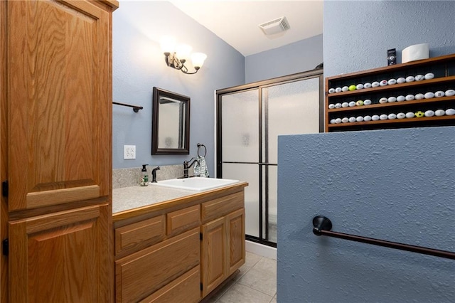8620 N Eastern Ave, Kansas City, MO 64157 - bathroom featuring a stall shower, vanity, tile patterned floors, and vaulted ceiling