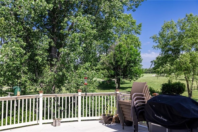 8620 N Eastern Ave, Kansas City, MO 64157 - wooden deck with area for grilling
