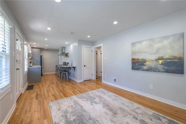 11417 Applewood Dr, Kansas City, MO 64134 - interior space featuring light wood finished floors and recessed lighting