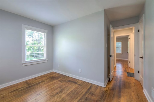 11417 Applewood Dr, Kansas City, MO 64134 - unfurnished room featuring wood finished floors