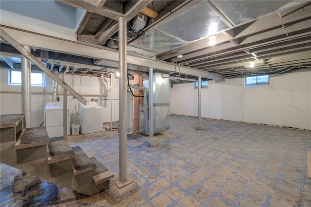 11417 Applewood Dr, Kansas City, MO 64134 - below grade area with separate washer and dryer, heating unit, and tile patterned floors