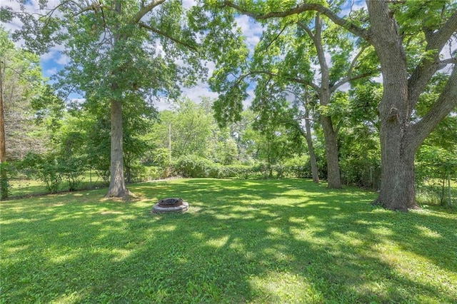 11417 Applewood Dr, Kansas City, MO 64134 - view of yard with a fire pit