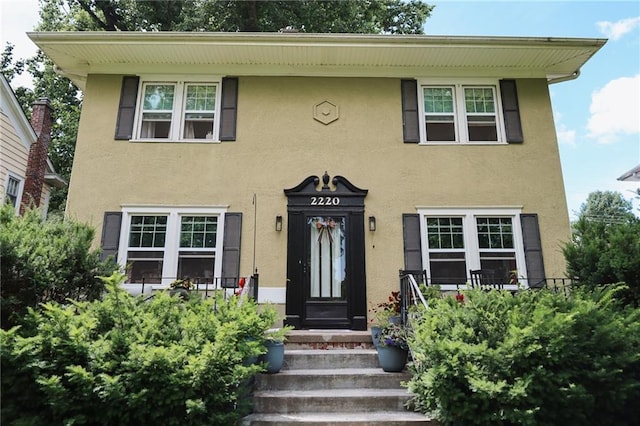 2220 Eugene Field Ave, Saint Joseph, MO 64505 - view of front of property with stucco siding