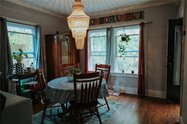 2220 Eugene Field Ave, Saint Joseph, MO 64505 - dining room with a chandelier, crown molding, and wood finished floors