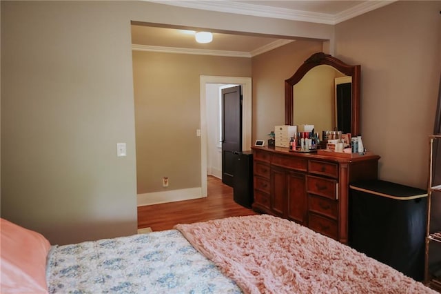 2220 Eugene Field Ave, Saint Joseph, MO 64505 - bedroom with wood finished floors and crown molding