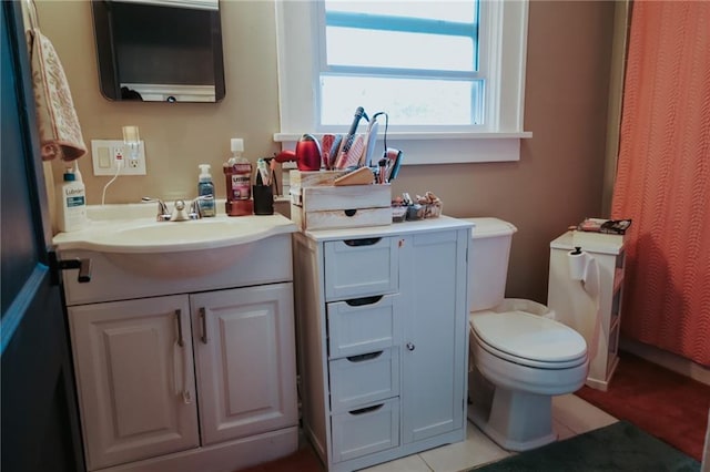 2220 Eugene Field Ave, Saint Joseph, MO 64505 - full bathroom with vanity and tile patterned flooring
